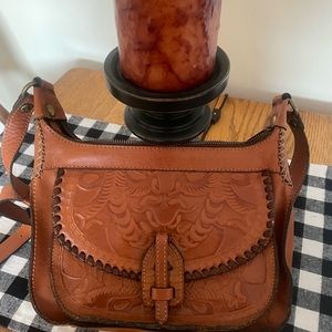 Patricia Nash cross body brown tan tooled leather purse.